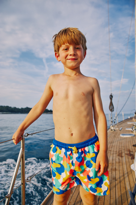 Boy wearing a swimsuit with buttoned belt Meno Bubbly Escape