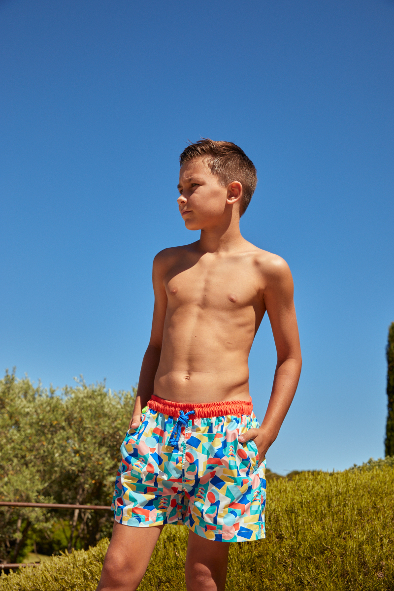 Boy wearing a swimsuit with elasticated belt Meno Caroline Derveaux