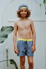 Boy wearing a swimsuit with belt Meno Sunny Azulejos