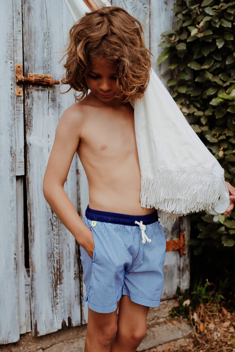 Boy wearing a swimsuit Meno Blue Seersucker